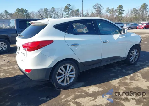 2010 Hyundai Tucson Limited z USA, uszkodzony, nr VIN KM8JUCAC6AU023730